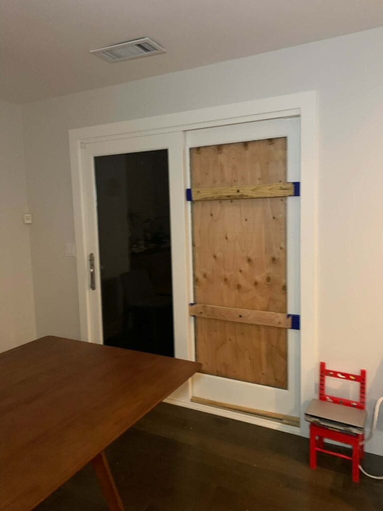 boarded up door